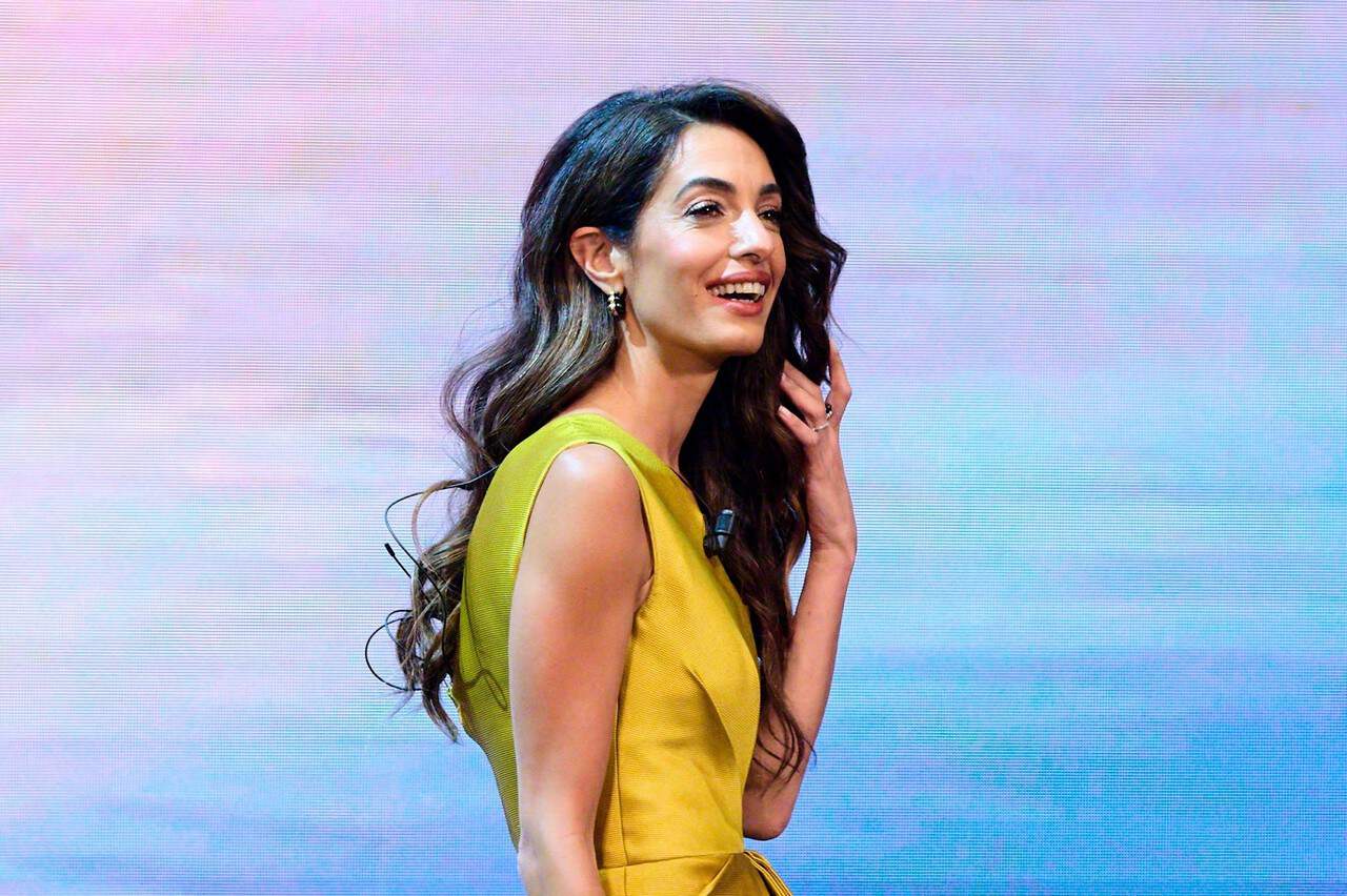Amal Clooney Radiates Elegance at We Choose Earth Tour Conference