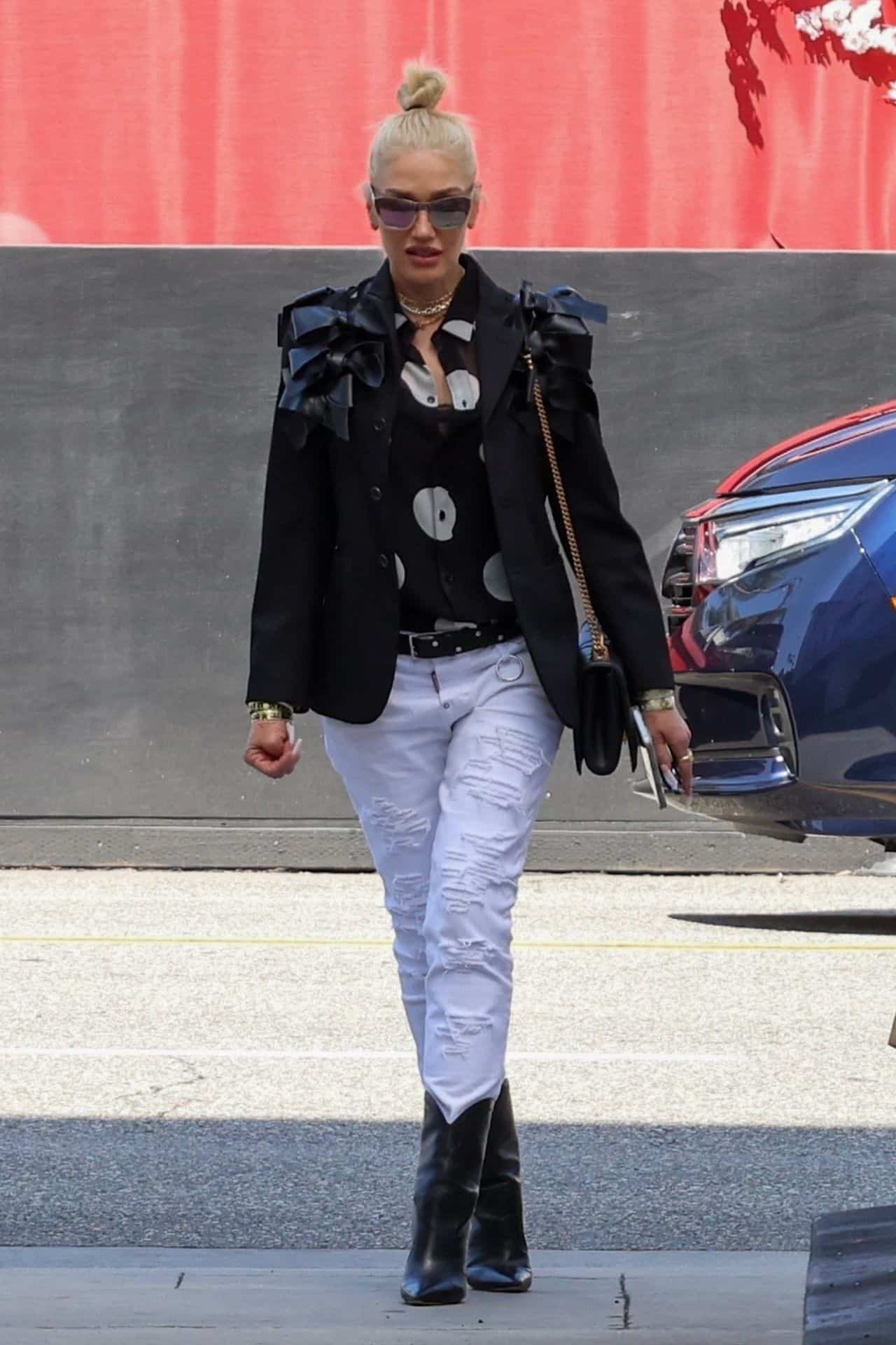 Gwen Stefani Displays her Chic Style in White Jeans and Black Blazer