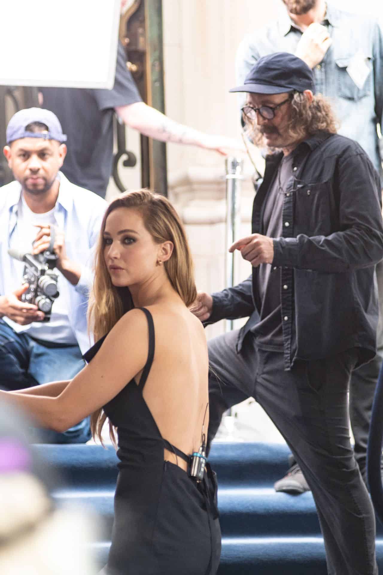 Jennifer Lawrence Stuns in Black Silk Dress in Dior Commercial Shoot in NYC
