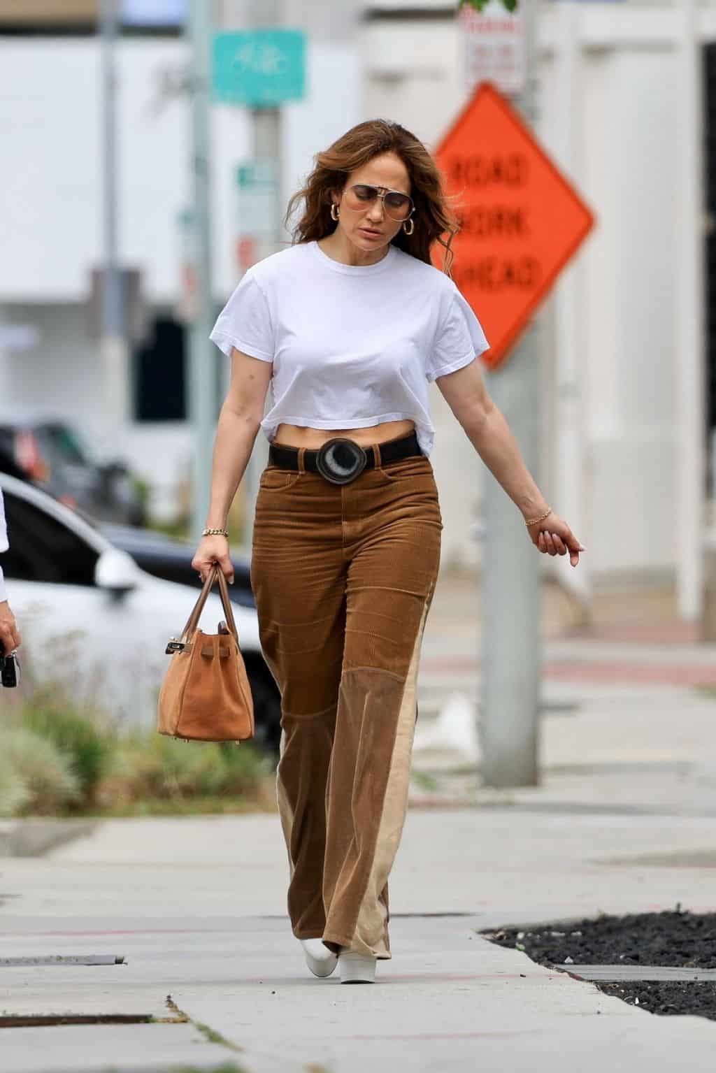 Jennifer Lopez Rocks 70's Style in Brown Corduroy Jeans as She Runs Errands