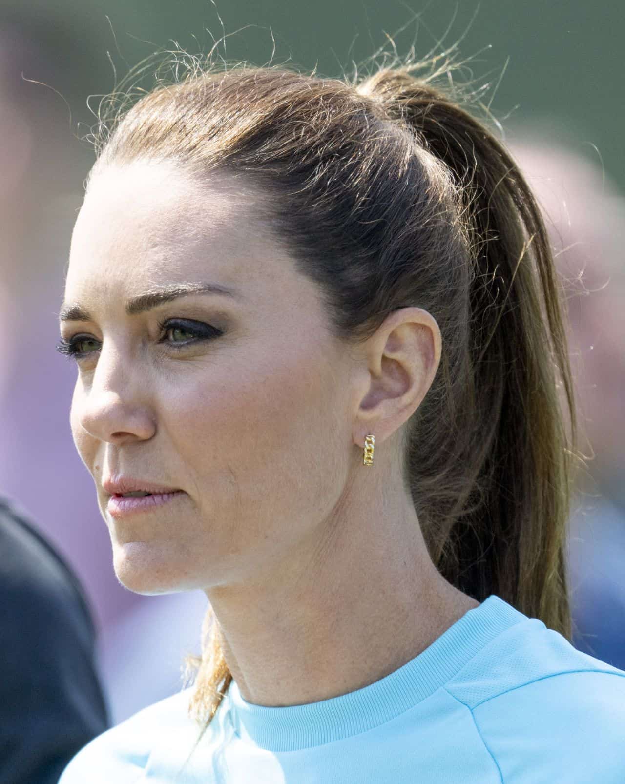 Kate Middleton Enjoys Playing Rugby in Sweatpants and White Sneakers