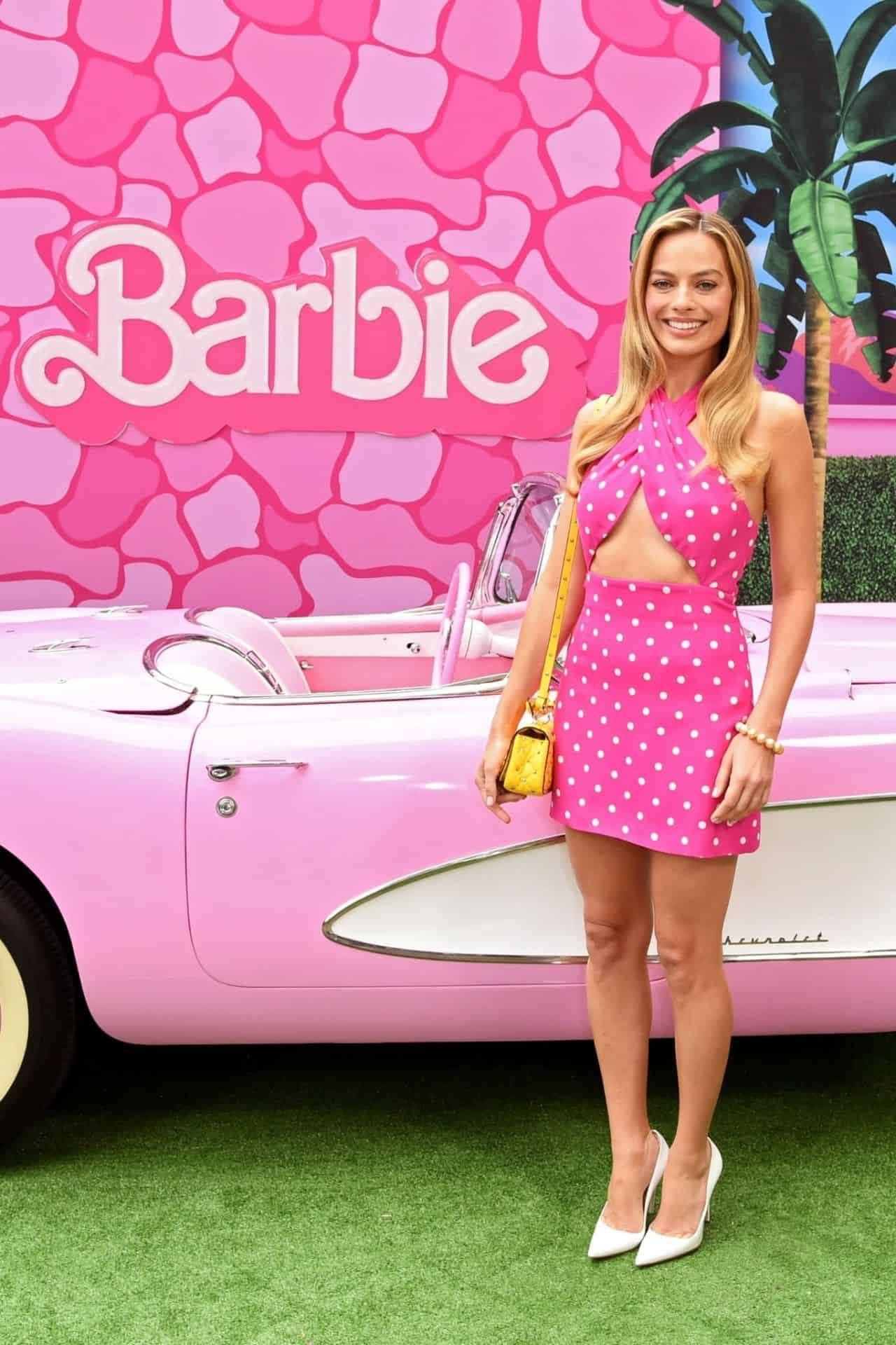 Margot Robbie Amazes at "Barbie" Photocall in Polka Dot Pink Mini Dress