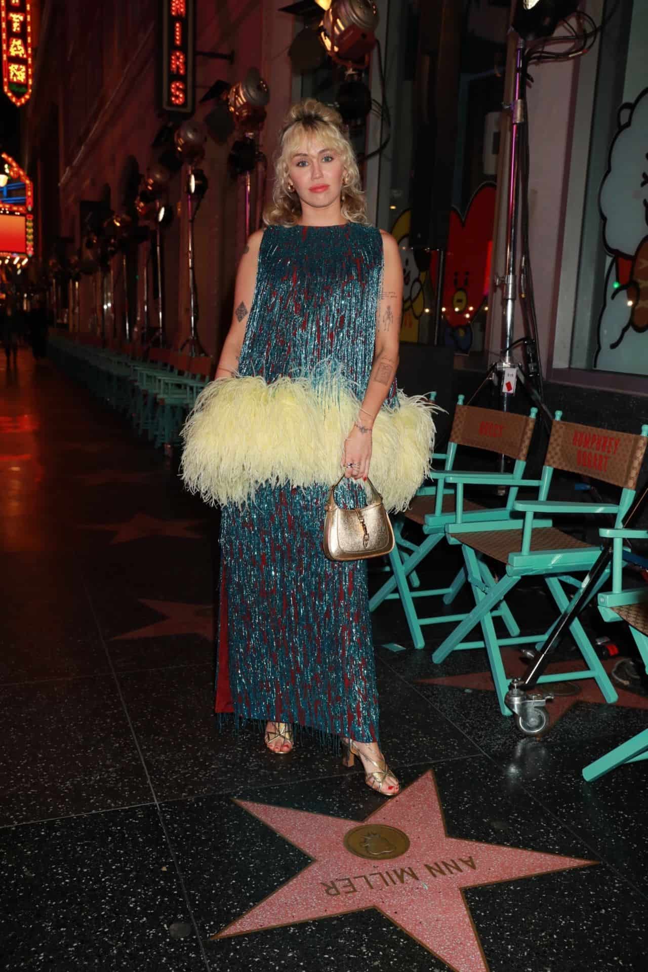 Miley Cyrus Dazzles in 1970s-inspired Outfit at Gucci Love Parade