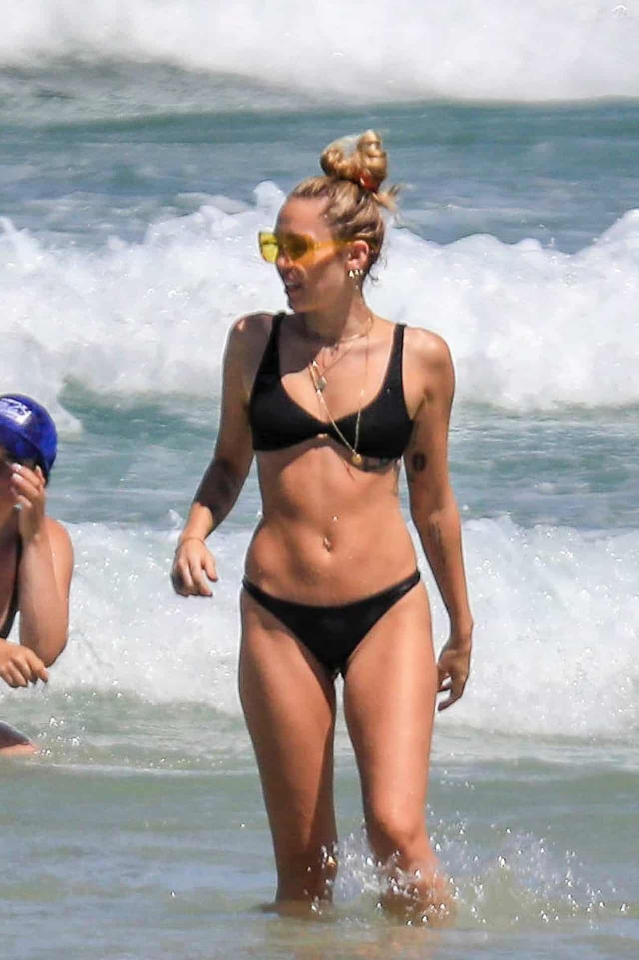 Miley Cyrus Flaunts Her Fit Physique in a Black Bikini at Byron Bay