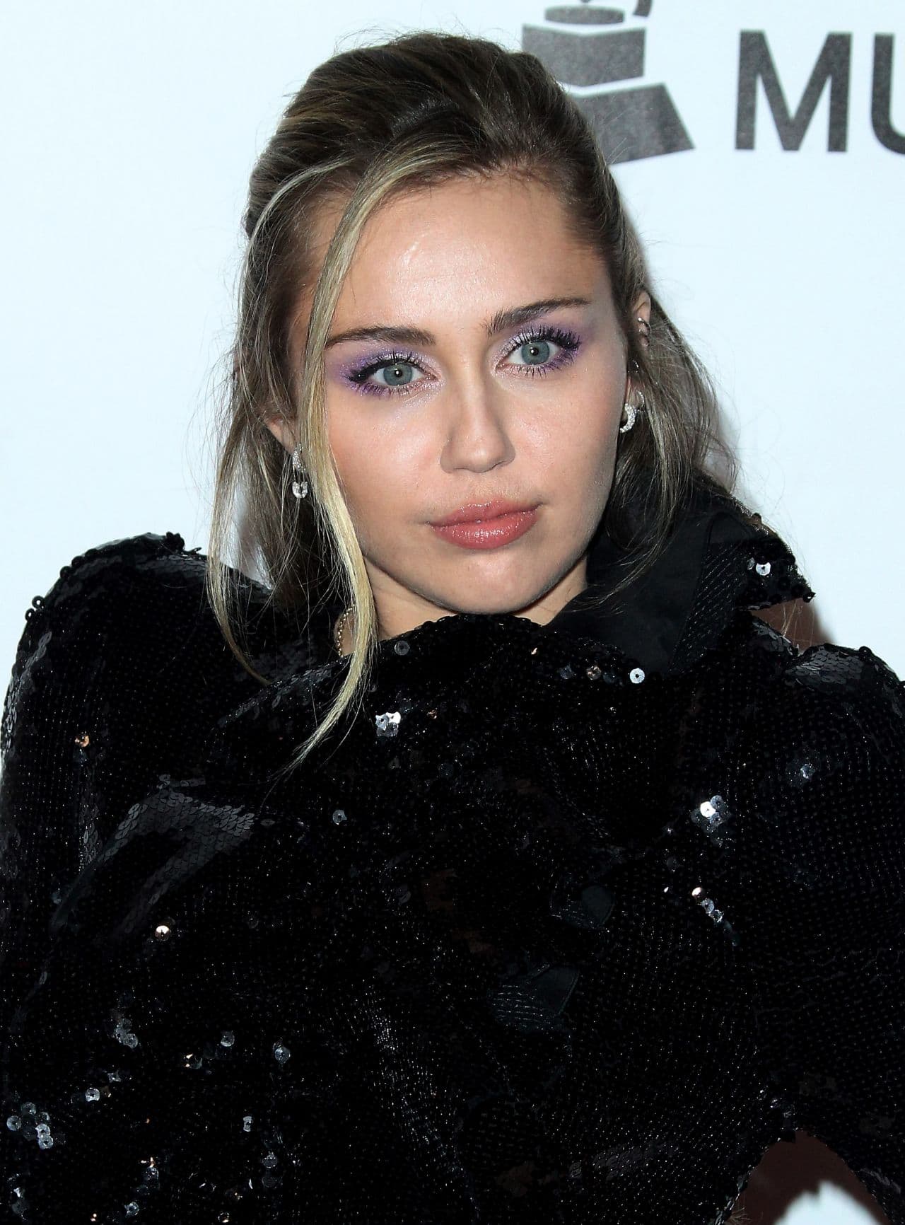 Miley Cyrus Shines in a Glamorous Little Black Dress at the MusiCares Event