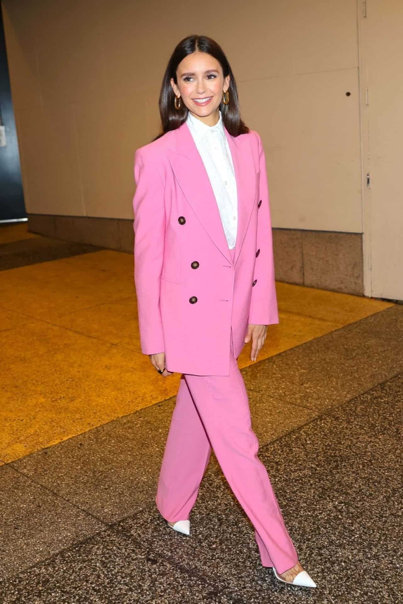 Nina Dobrev Rocks a Stylish Pink Suit for “The Out-Laws” Promotion