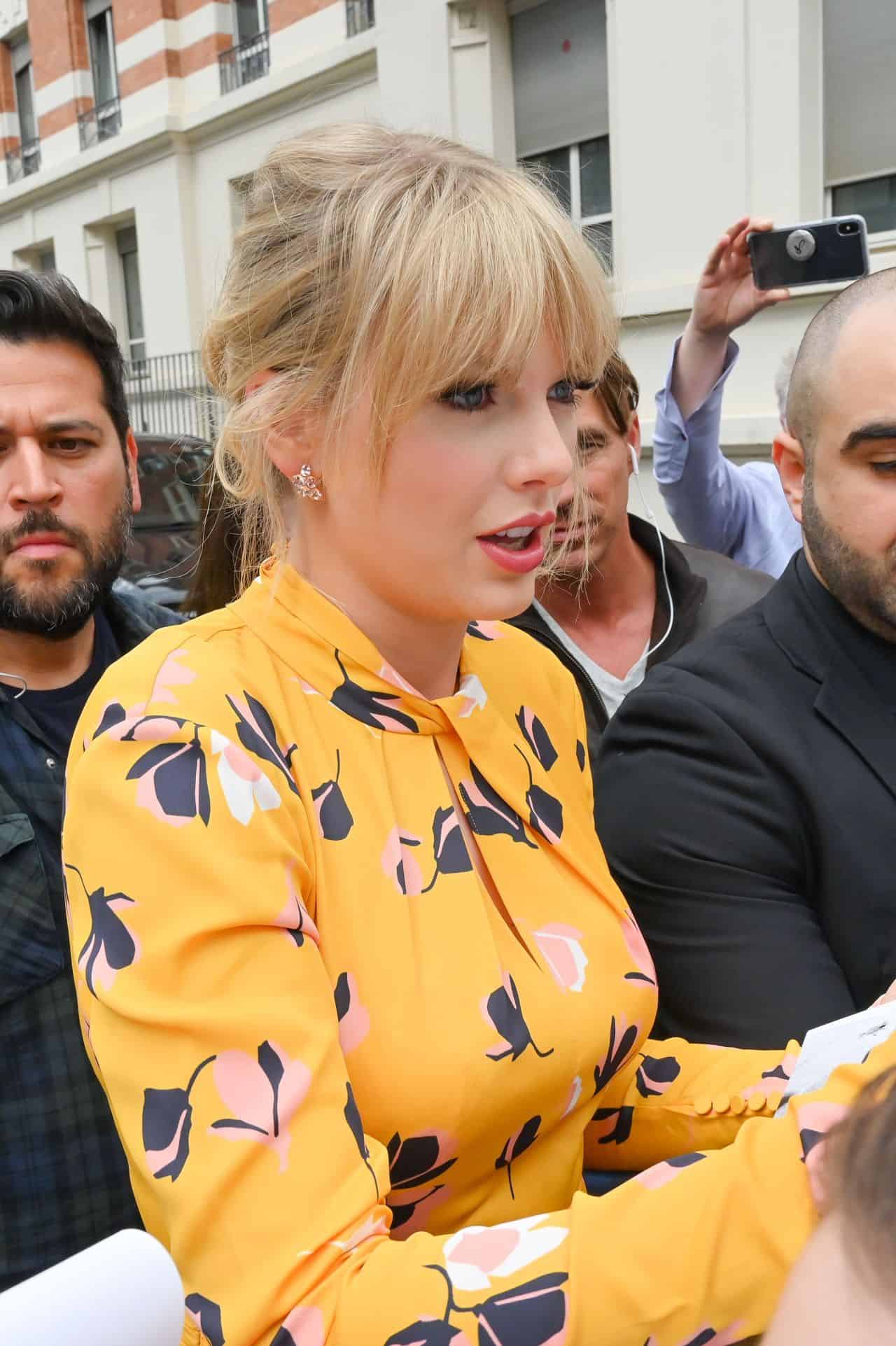 Taylor Swift Radiates Seasonal Chicness on the Streets of Paris