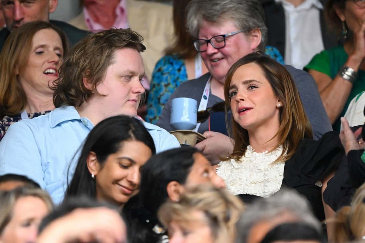 Emma Watson Stuns in a White Lace Mini Dress at Wimbledon with Her Father