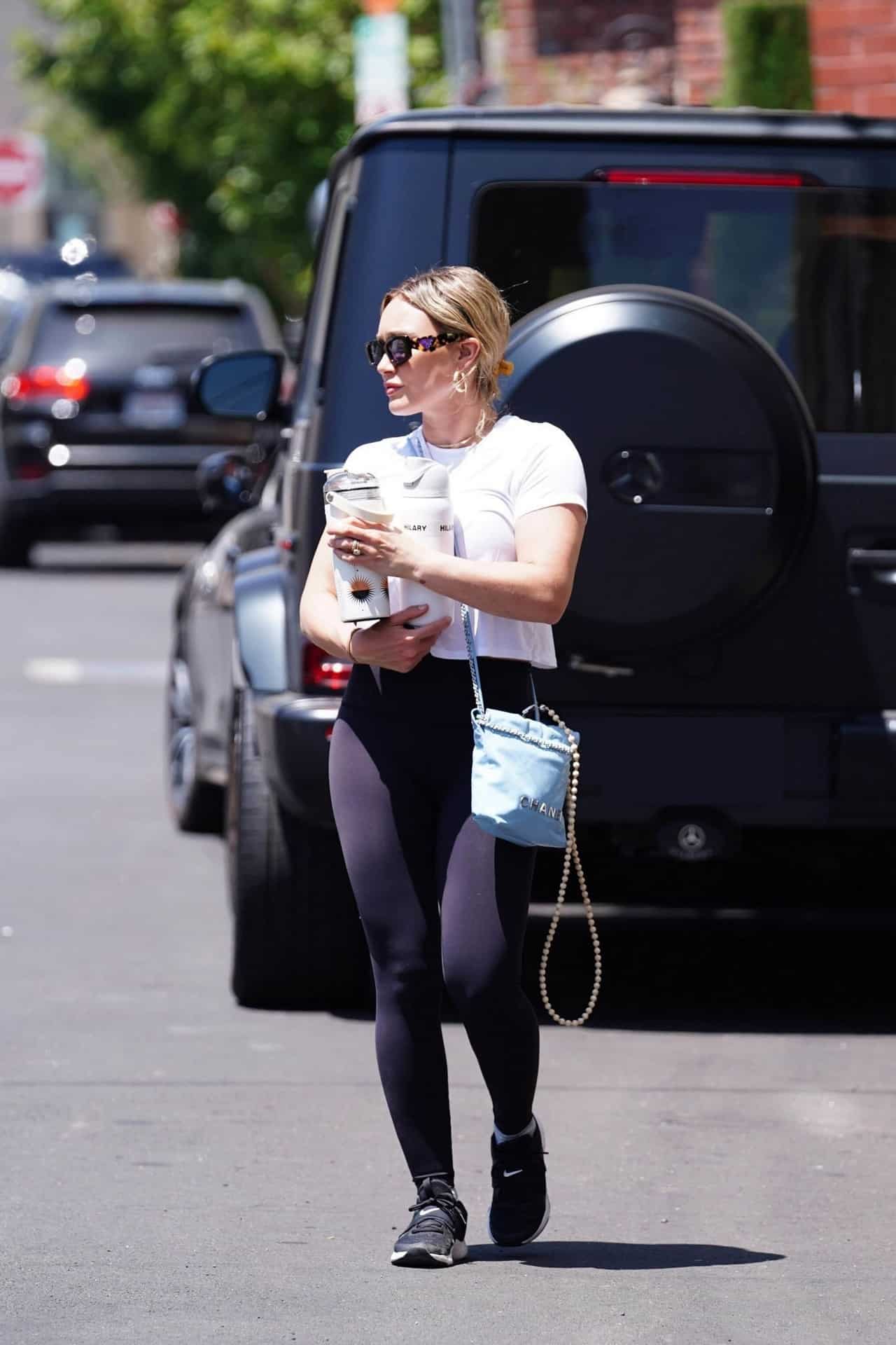 Hilary Duff Rocks Gym Style with Black Leggings and Nike Sneakers
