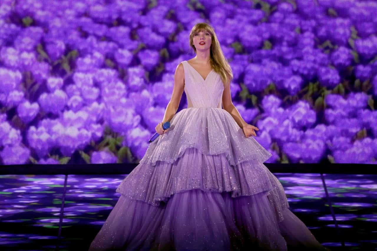 Taylor Swift Takes the Stage in Glittering Purple Gown at Eras Tour Show