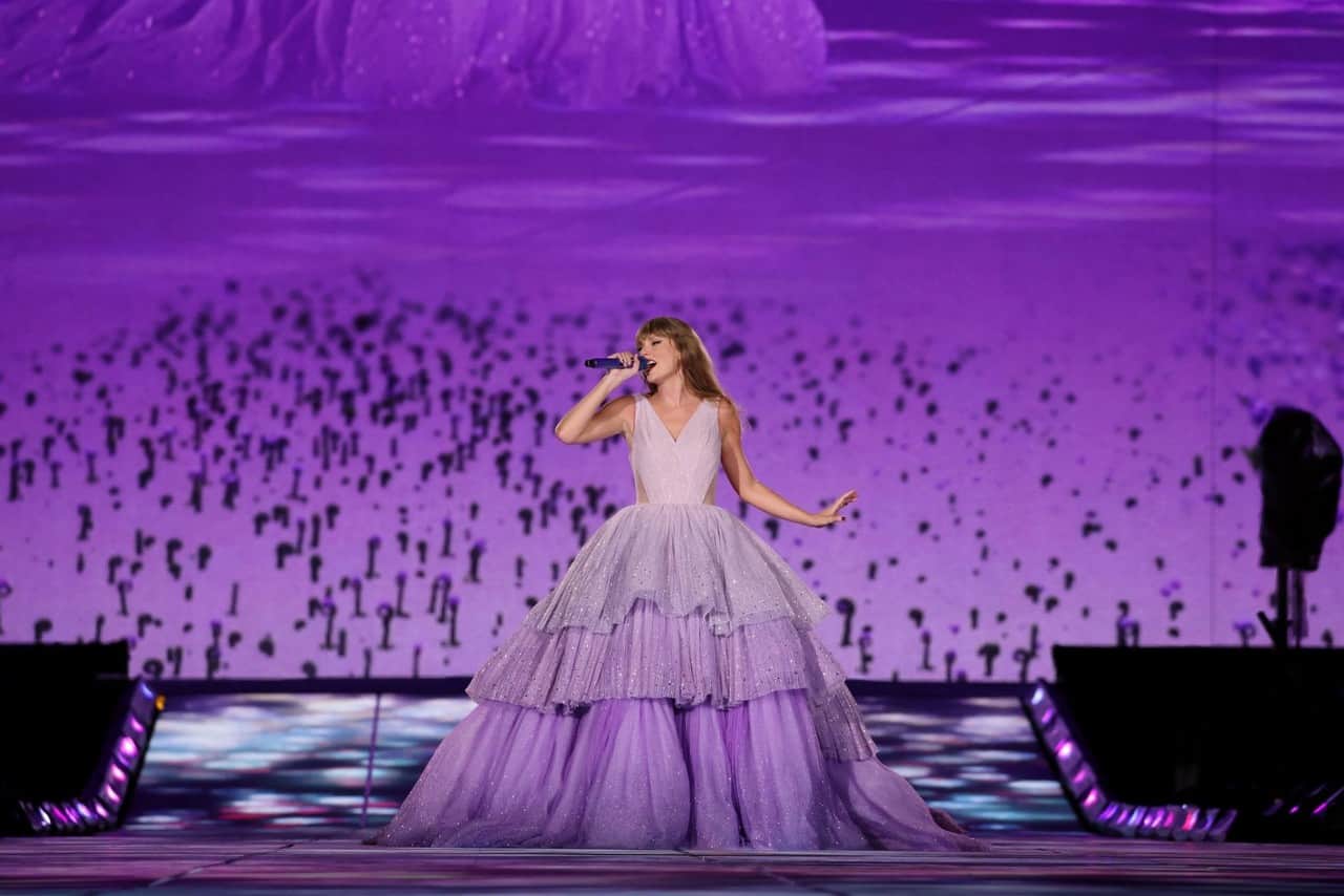 Taylor Swift Takes the Stage in Glittering Purple Gown at Eras Tour Show