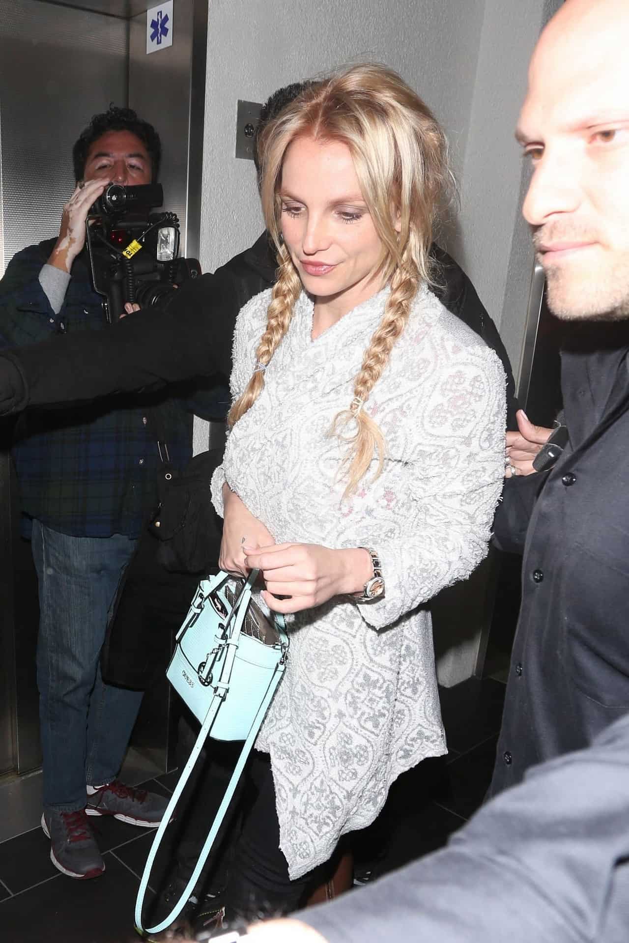 Britney Spears Looks Effortlessly Chic in White Lace Top and Jeans at LAX