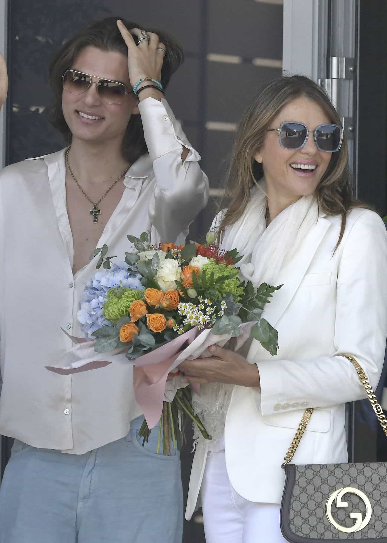 Elizabeth Hurley and Son Damian Look Stylish in Matching White Outfits