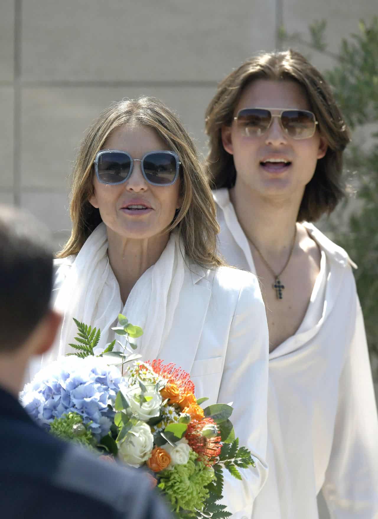 Elizabeth Hurley and Son Damian Look Stylish in Matching White Outfits