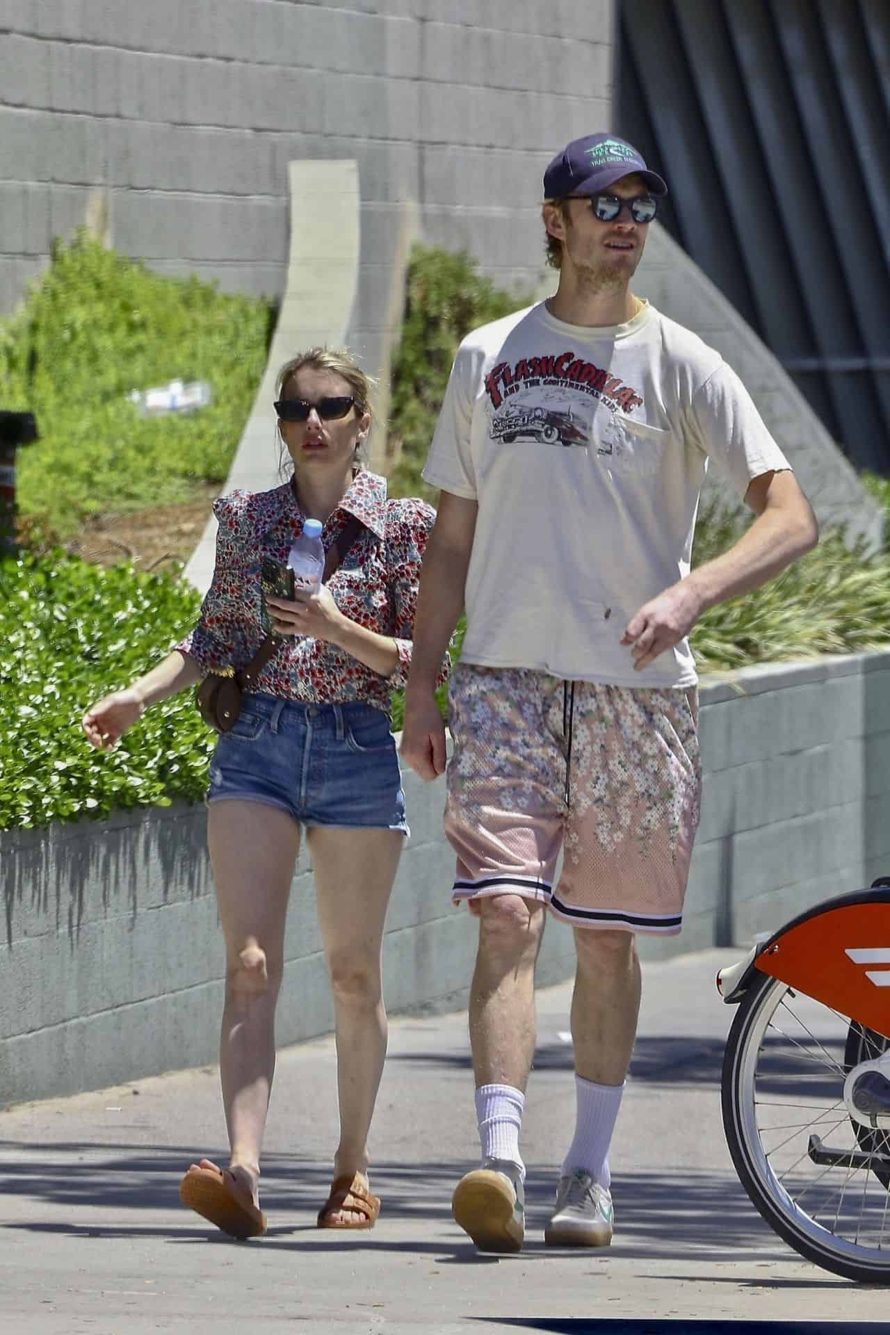 Emma Roberts Shows Off Her Legs in Daisy Dukes While Out with Cody John