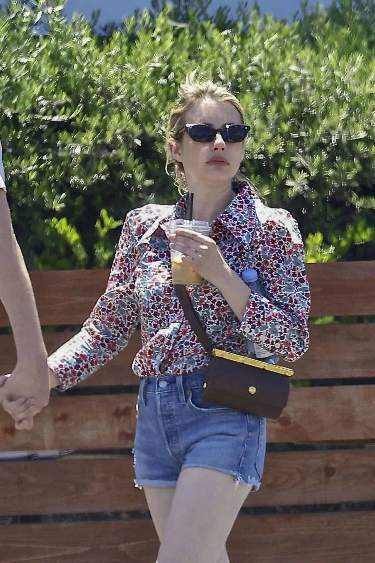 Emma Roberts Shows Off Her Legs in Daisy Dukes While Out with Cody John