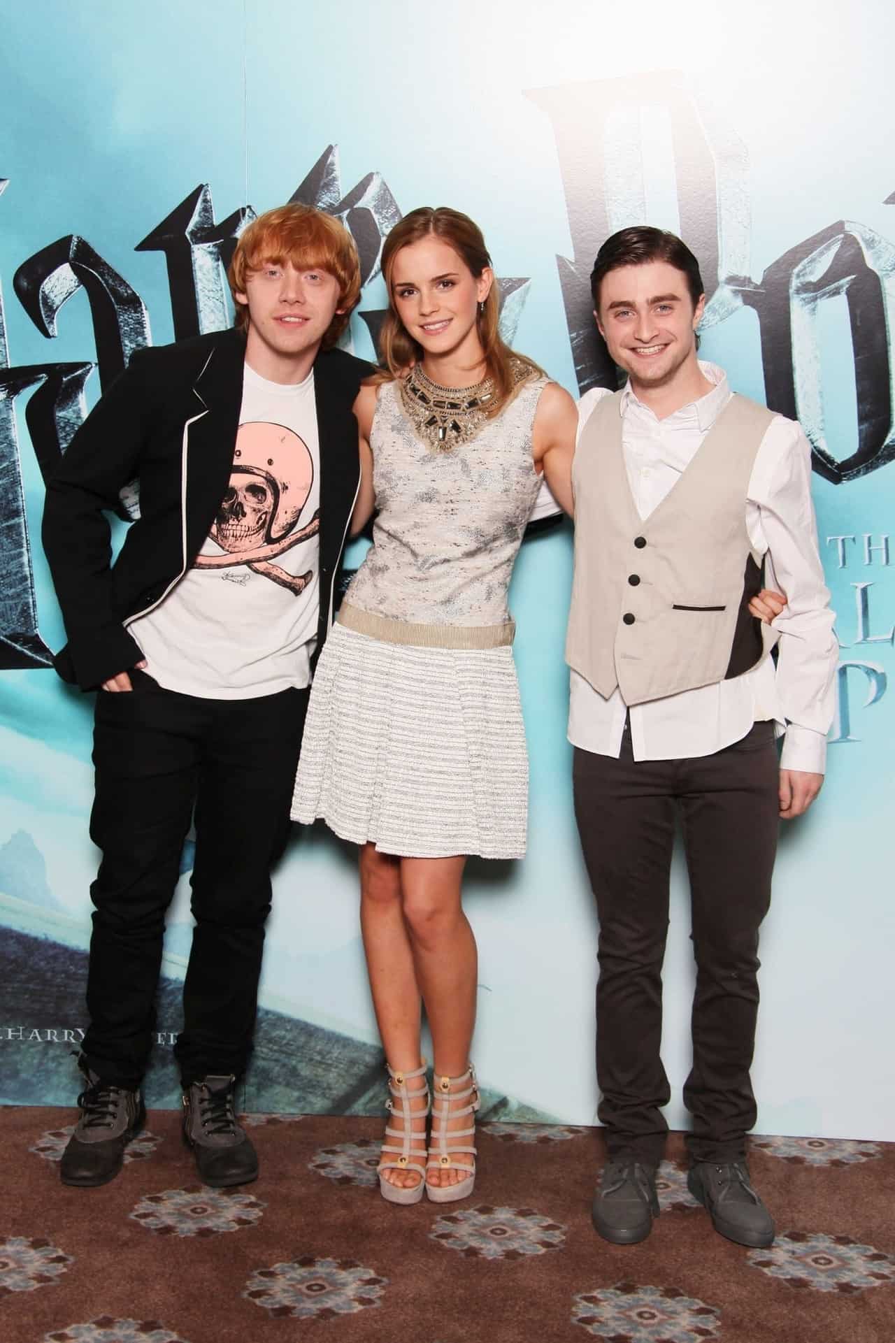 Emma Watson Stuns in Sleek White Mini Dress at Harry Potter Photocall