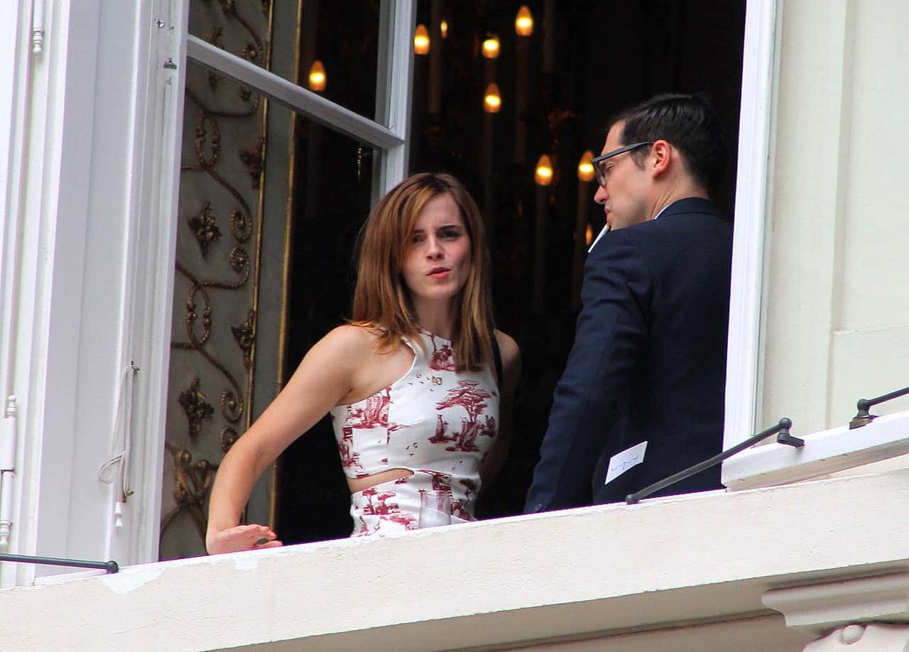 Emma Watson Wears Modest Yet Fashion-Forward Dress at Friend's Wedding