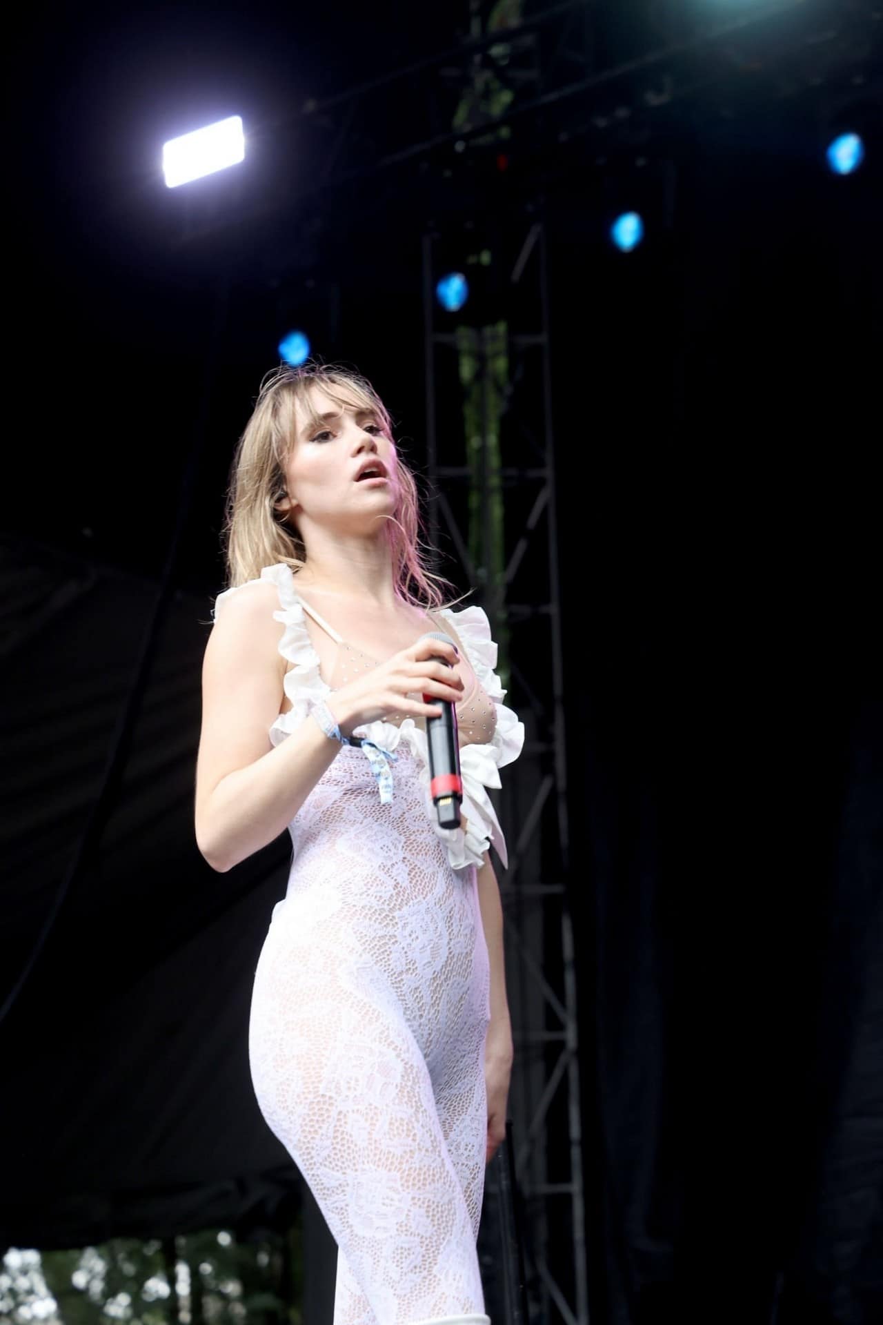 Suki Waterhouse Sizzles in Plunging Lace Jumpsuit at Lollapalooza