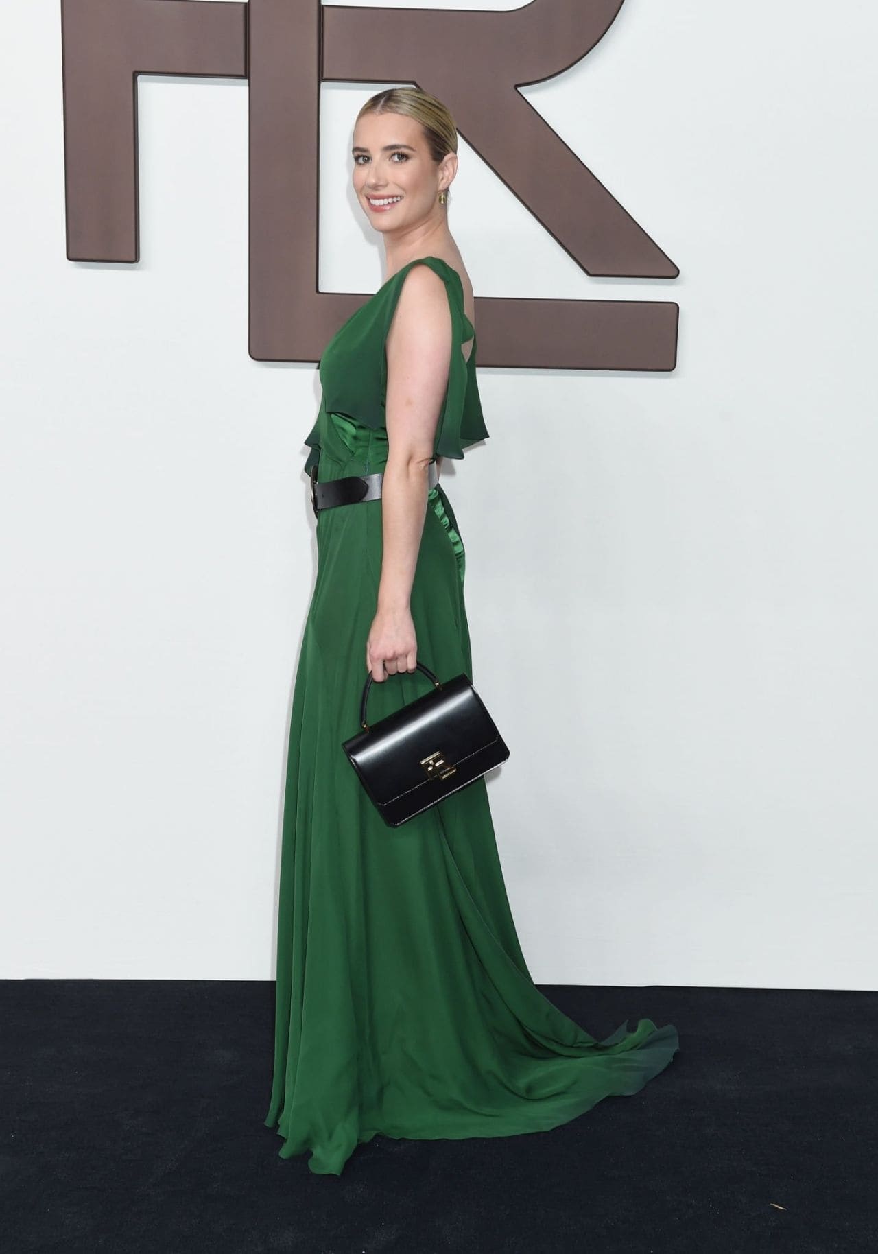 Emma Roberts Turns Heads in Racy Emerald Dress at Ralph Lauren NYFW Show
