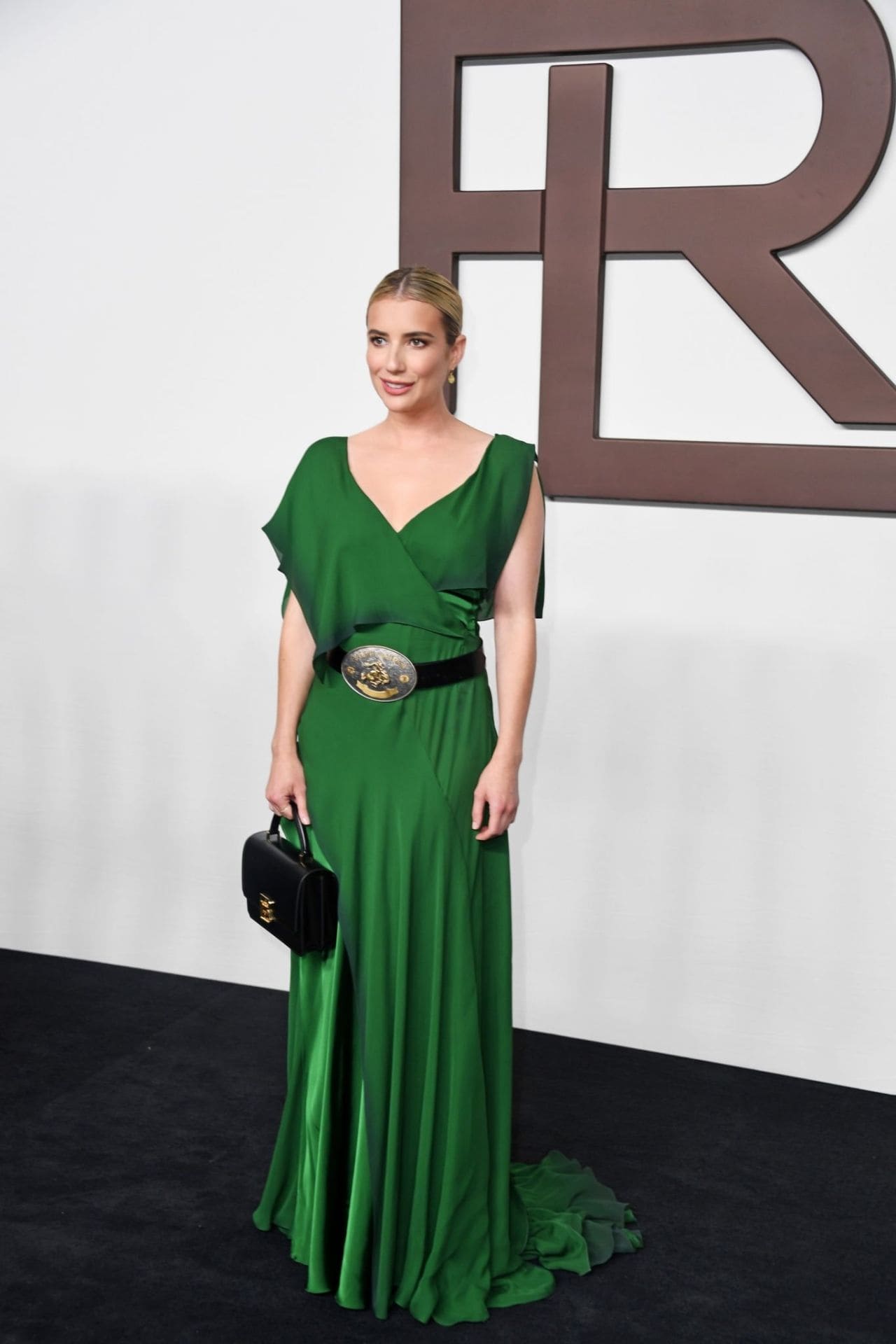 Emma Roberts Turns Heads in Racy Emerald Dress at Ralph Lauren NYFW Show