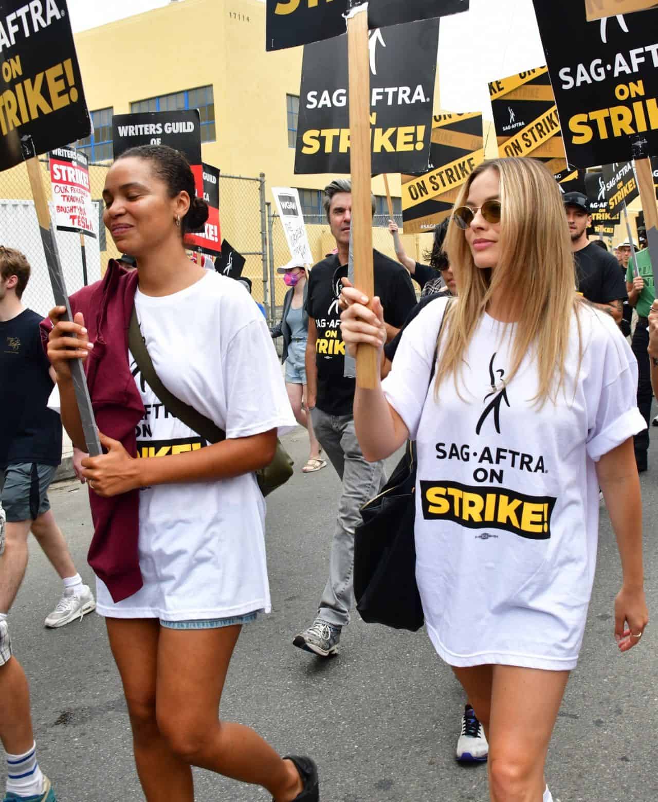 Margot Robbie Shows Solidarity with Writers Guild in "Double Strike"