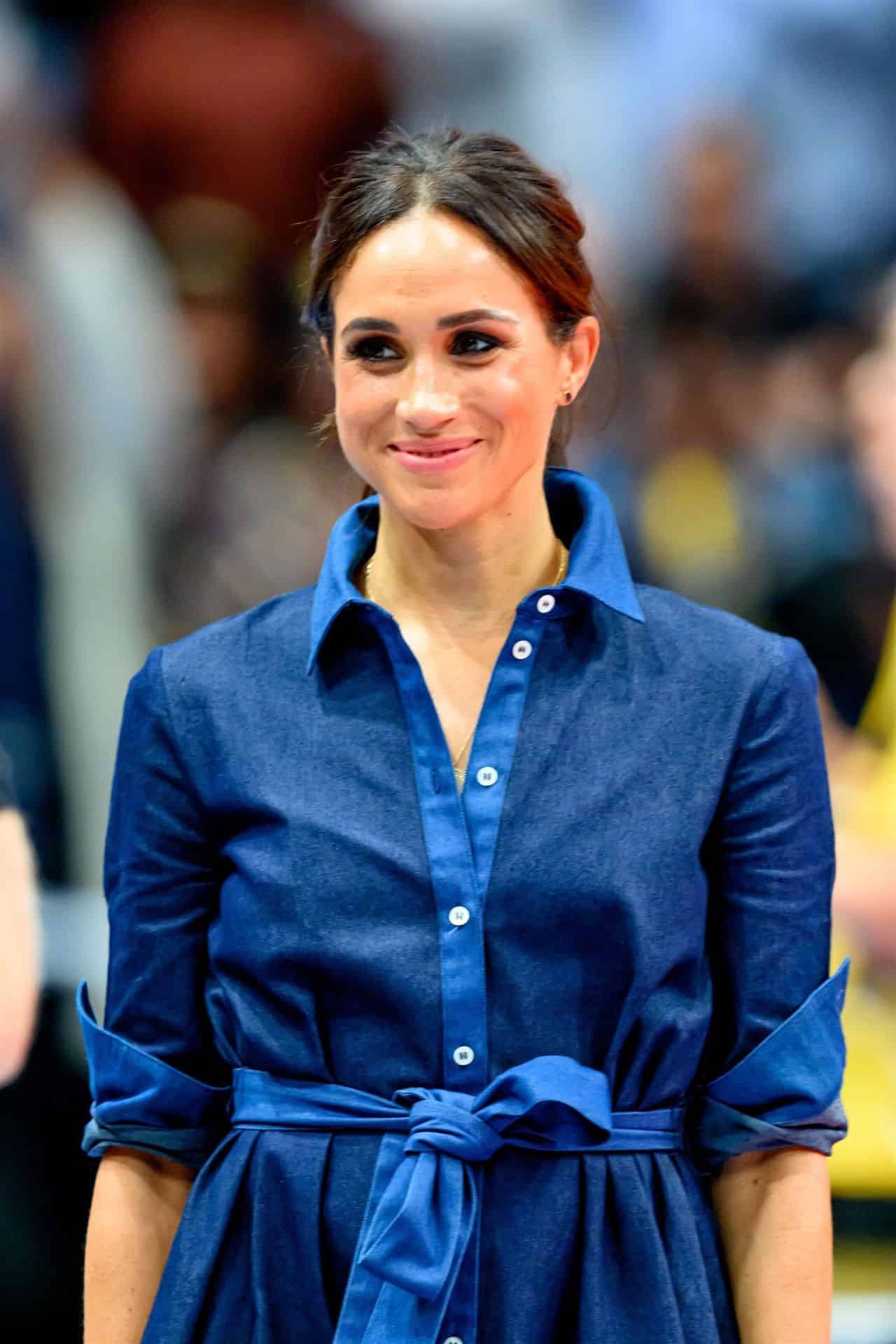 Meghan Markle Graces Invictus Games 2023 in Chic Denim Shirtdress