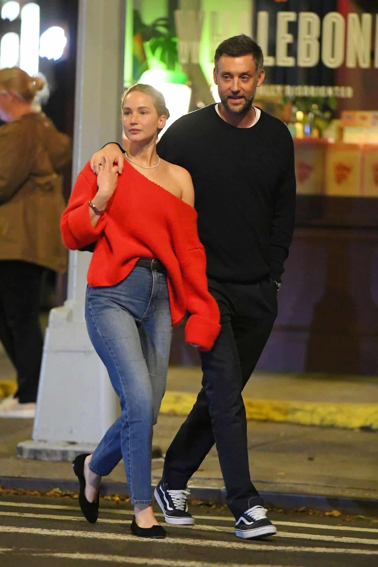 jennifer lawrence exudes nyc chic in red sweater and high waisted jeans 2