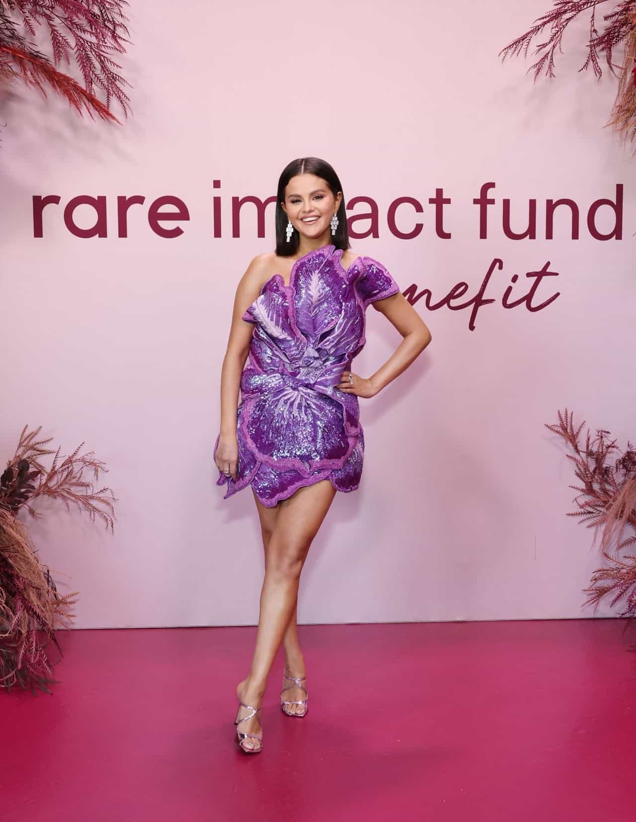 Selena Gomez Wows in Purple Floral Minidress at Rare Impact Fund Benefit