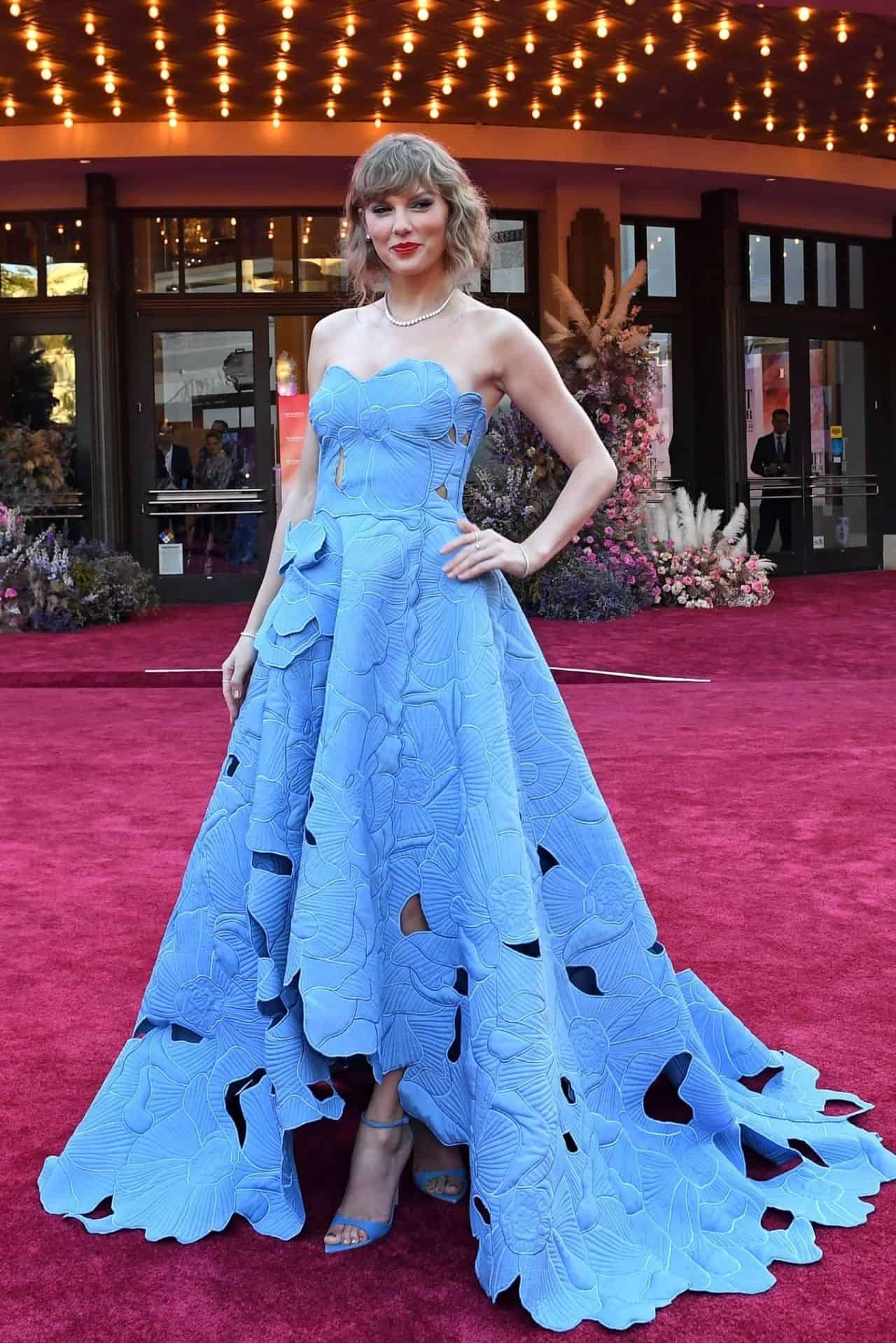 taylor swifts sparkling style steals the show at eras tour movie premiere 14
