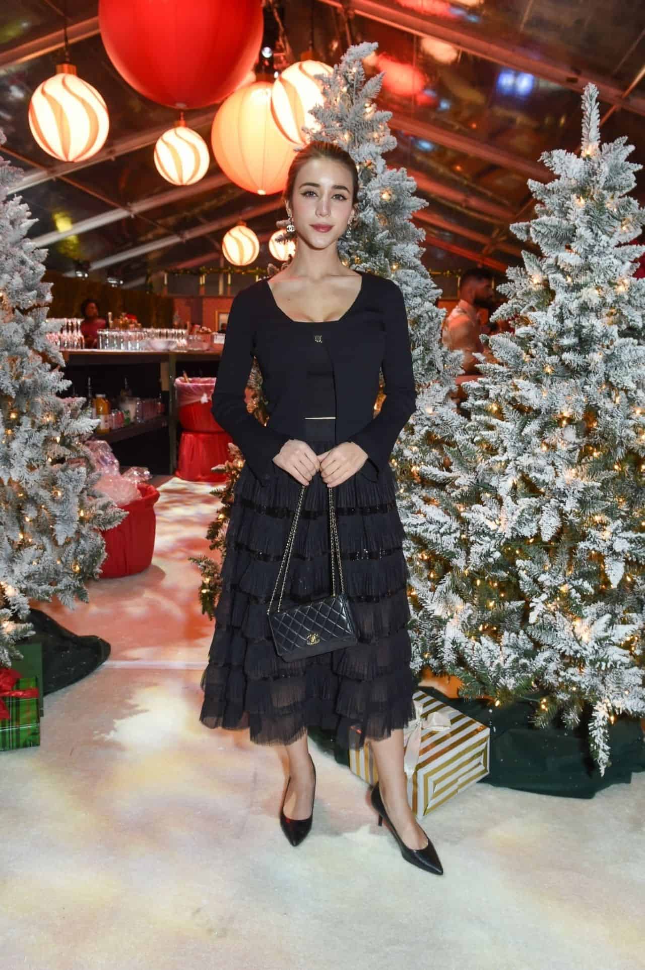 Caylee Cowan Flaunts Style and Grace in Black at Candy Cane Lane Premiere
