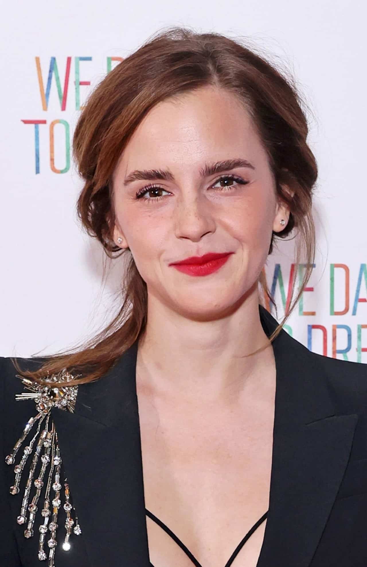 Emma Watson Turns Heads with Chic Black Suit at We Dare to Dream Premiere