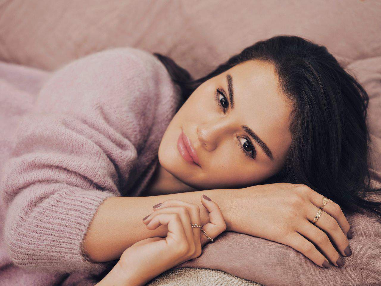 Selena Gomez Glows while Advertising Rare Beauty Body Collection Dec 2023