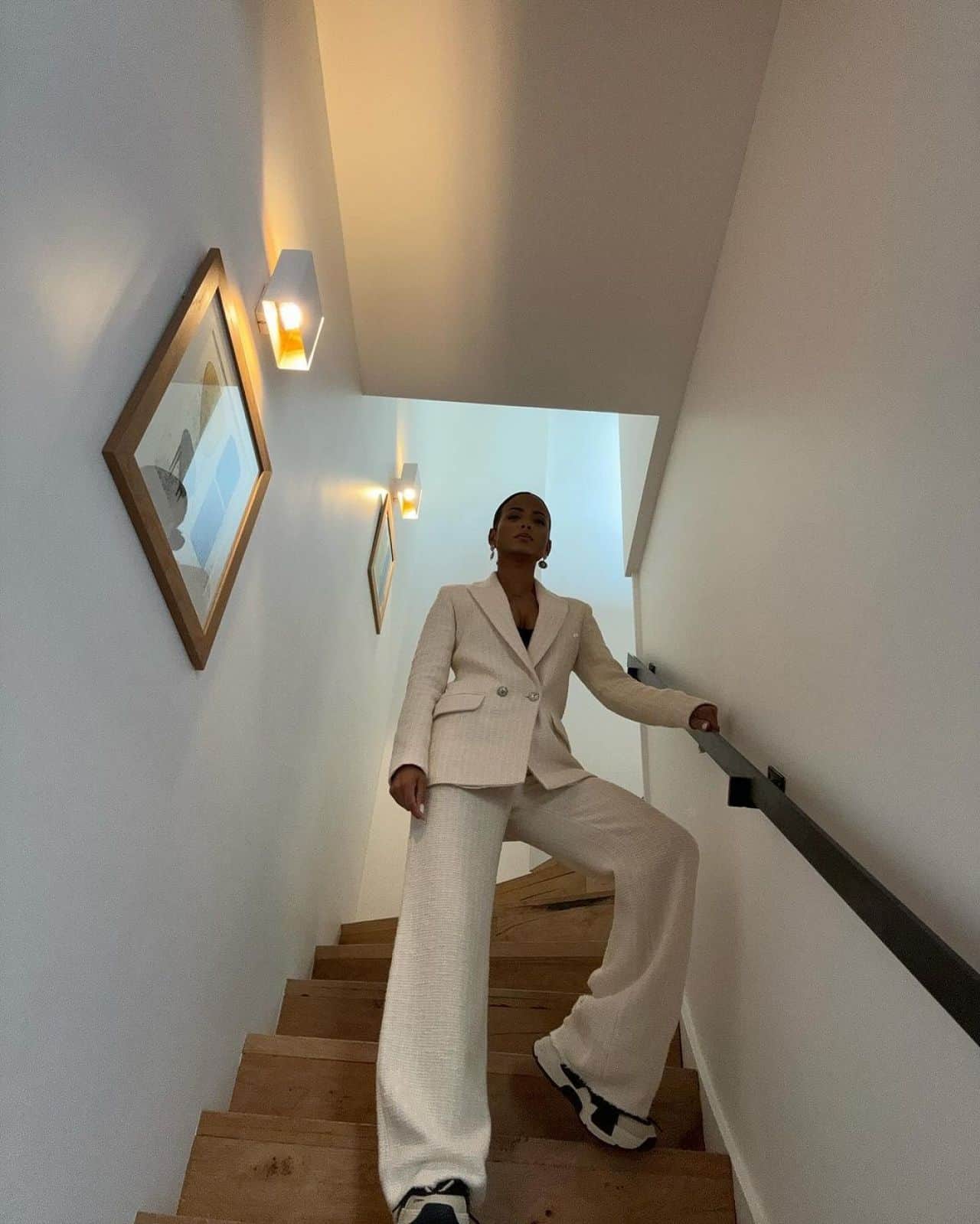 Christina Milian Radiates Elegance in Pristine White Suit and Stylish Sneakers