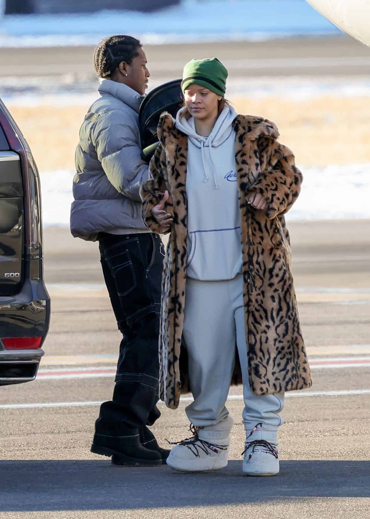 Rihanna Dazzles in Leopard Print Coat and Chic White Ensemble at Aspen Airport
