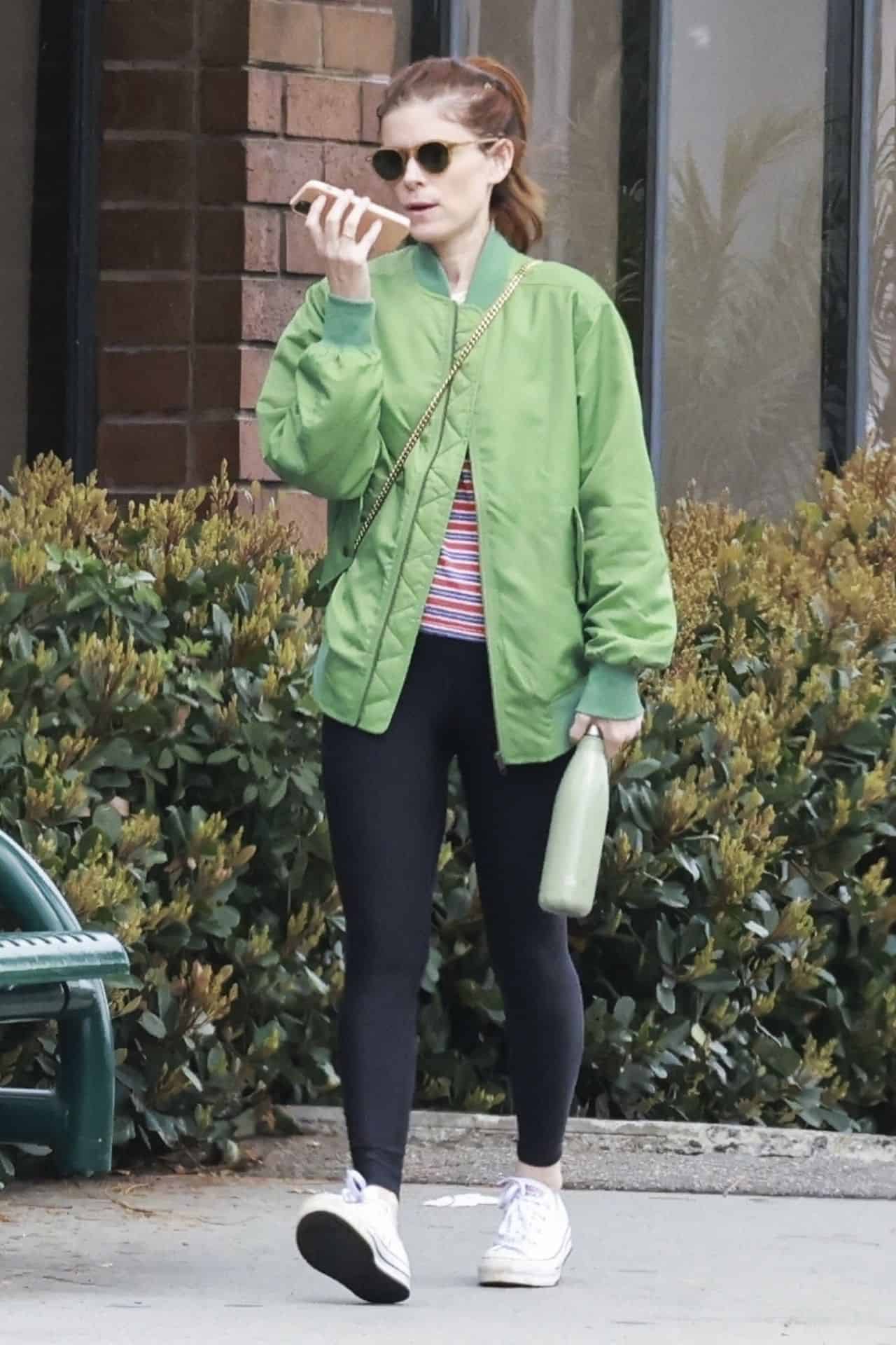 Kate Mara Embraces Casual Chic in Vibrant Green Jacket and Black Leggings