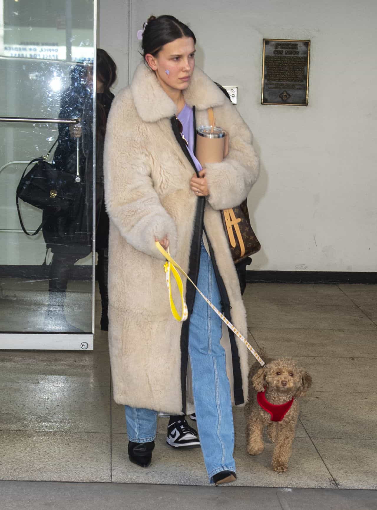 Millie Bobby Brown, a Vision of Winter Chic, Takes Her Dog for a Walk