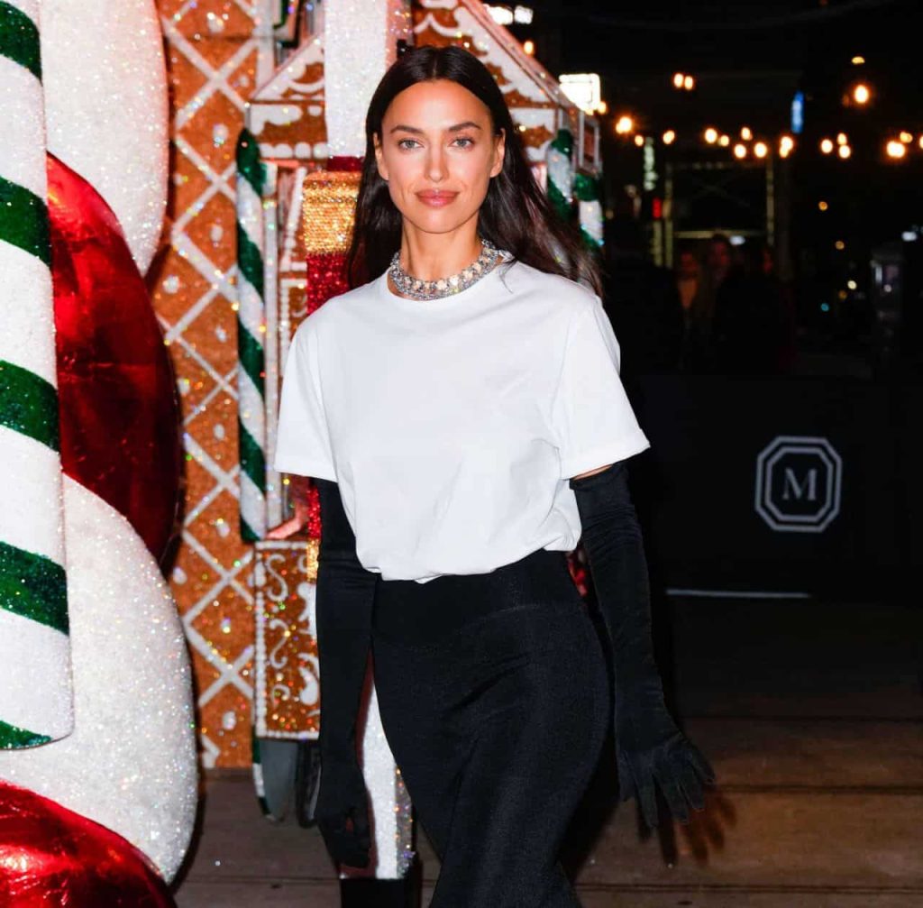 Irina Shayk Wears a Black Fitted Skirt at the Swarovski Holiday Event in NYC.